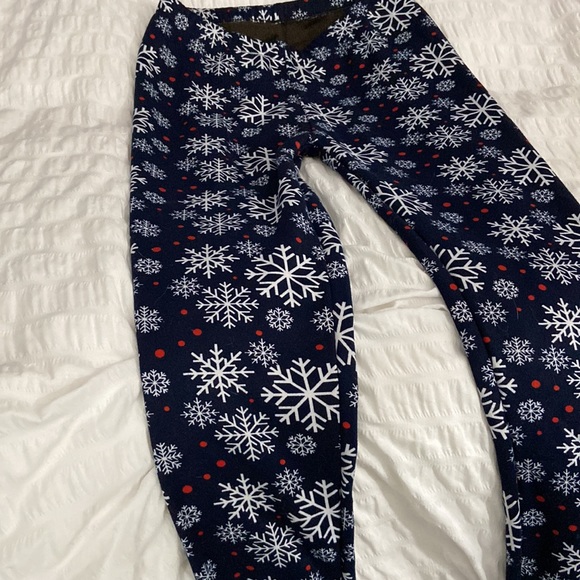 Cozy fleece lined winter leggings.  Snowflake motif.  Super cozy and warm. - Picture 3 of 3